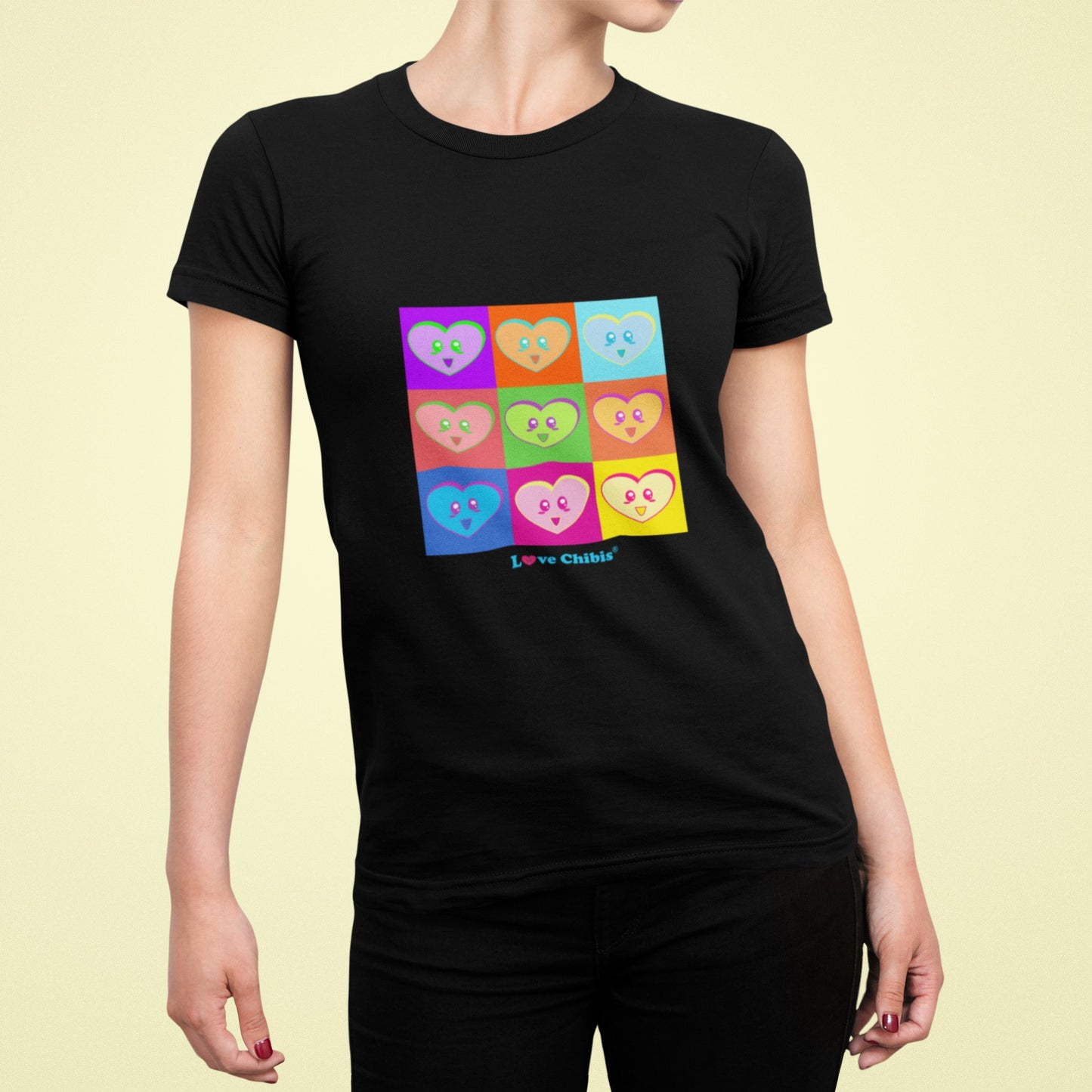 women in a black Love Chbis heart mosaic t-shirt